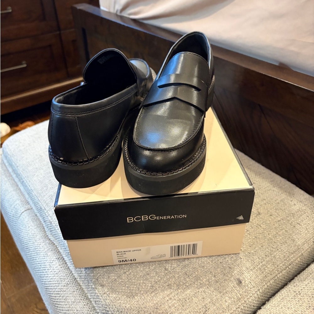 BCBGeneration Women’s  Classic Black Slip-Ons
